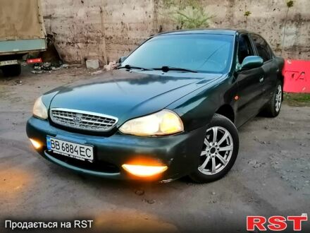 Киа Кларус 1998 в Каменское - Днепродзержинск на Automoto.ua Зеленый Киа Кларус, объемом двигателя 2 л и пробегом 313 тыс. км за 1500 $, фото 1 на Automoto.ua