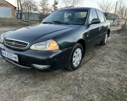 Зелений Кіа Кларус, об'ємом двигуна 1.8 л та пробігом 250 тис. км за 1200 $, фото 1 на Automoto.ua