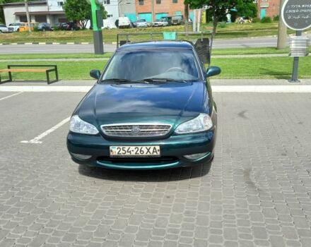 Зелений Кіа Кларус, об'ємом двигуна 2 л та пробігом 310 тис. км за 1800 $, фото 1 на Automoto.ua