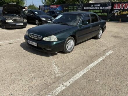 Киа Кларус 1999 в Первомайск на Automoto.ua Зеленый Киа Кларус, объемом двигателя 2 л и пробегом 298 тыс. км за 1800 $, фото 1 на Automoto.ua