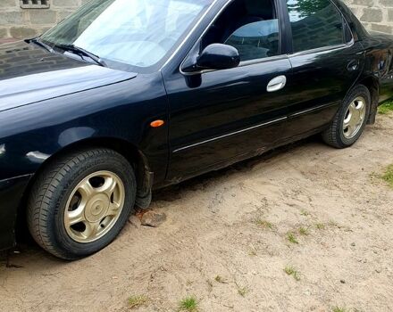 Чорний Кіа Кредос, об'ємом двигуна 2 л та пробігом 315 тис. км за 900 $, фото 1 на Automoto.ua