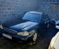 Черный Киа Кредос, объемом двигателя 2 л и пробегом 300 тыс. км за 800 $, фото 1 на Automoto.ua
