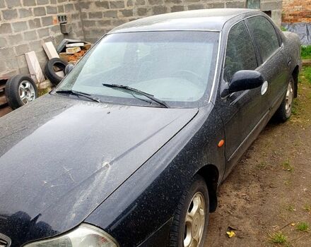 Чорний Кіа Кредос, об'ємом двигуна 2 л та пробігом 315 тис. км за 900 $, фото 7 на Automoto.ua