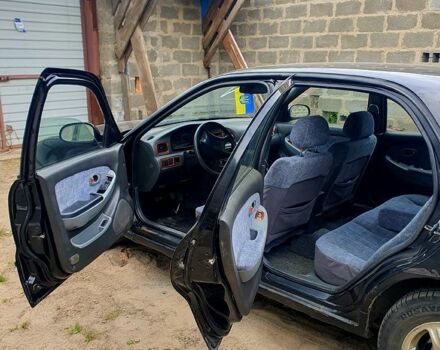 Чорний Кіа Кредос, об'ємом двигуна 2 л та пробігом 315 тис. км за 900 $, фото 2 на Automoto.ua