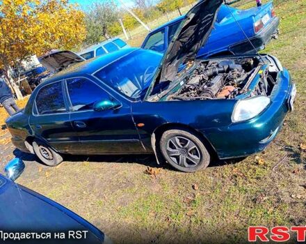Зелений Кіа Кредос, об'ємом двигуна 2 л та пробігом 100 тис. км за 1800 $, фото 3 на Automoto.ua