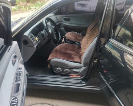 Черный Киа Другая, объемом двигателя 2 л и пробегом 240 тыс. км за 4100 $, фото 4 на Automoto.ua