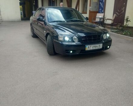 Черный Киа Другая, объемом двигателя 2 л и пробегом 240 тыс. км за 4100 $, фото 3 на Automoto.ua