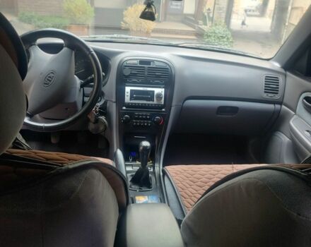 Черный Киа Другая, объемом двигателя 2 л и пробегом 240 тыс. км за 4100 $, фото 6 на Automoto.ua