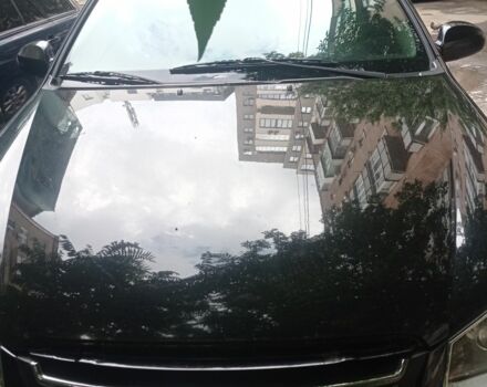 Черный Киа Другая, объемом двигателя 2 л и пробегом 184 тыс. км за 6100 $, фото 2 на Automoto.ua