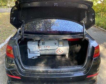 Черный Киа Другая, объемом двигателя 2 л и пробегом 200 тыс. км за 7600 $, фото 5 на Automoto.ua