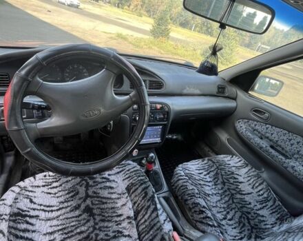 Красный Киа Другая, объемом двигателя 1.5 л и пробегом 245 тыс. км за 1100 $, фото 5 на Automoto.ua