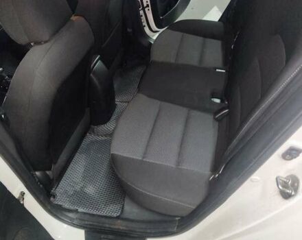 Білий Кіа Форте, об'ємом двигуна 2 л та пробігом 133 тис. км за 9900 $, фото 12 на Automoto.ua