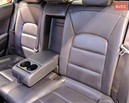 Белый Киа Форте, объемом двигателя 1.59 л и пробегом 90 тыс. км за 12500 $, фото 34 на Automoto.ua