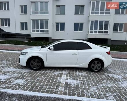 Белый Киа Форте, объемом двигателя 2 л и пробегом 209 тыс. км за 7500 $, фото 9 на Automoto.ua