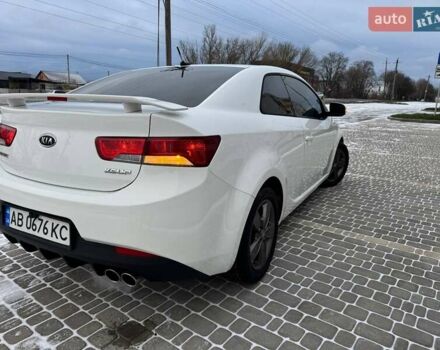 Белый Киа Форте, объемом двигателя 2 л и пробегом 209 тыс. км за 7500 $, фото 16 на Automoto.ua