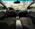Білий Кіа Форте, об'ємом двигуна 2 л та пробігом 210 тис. км за 7990 $, фото 32 на Automoto.ua