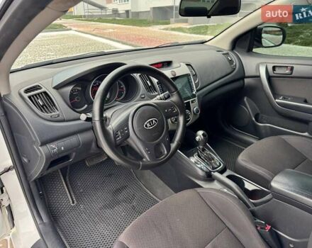 Белый Киа Форте, объемом двигателя 2 л и пробегом 209 тыс. км за 7500 $, фото 37 на Automoto.ua