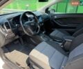 Білий Кіа Форте, об'ємом двигуна 2 л та пробігом 164 тис. км за 8900 $, фото 4 на Automoto.ua