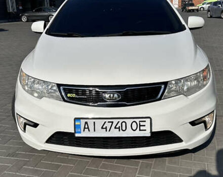 Белый Киа Форте, объемом двигателя 2 л и пробегом 240 тыс. км за 6800 $, фото 1 на Automoto.ua