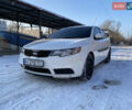 Белый Киа Форте, объемом двигателя 2 л и пробегом 230 тыс. км за 7300 $, фото 1 на Automoto.ua