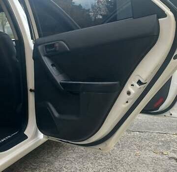 Киа Форте 2012 в Нетешине на Automoto.ua Белый Киа Форте, объемом двигателя 2 л и пробегом 213 тыс. км за 7400 $, фото 12 на Automoto.ua