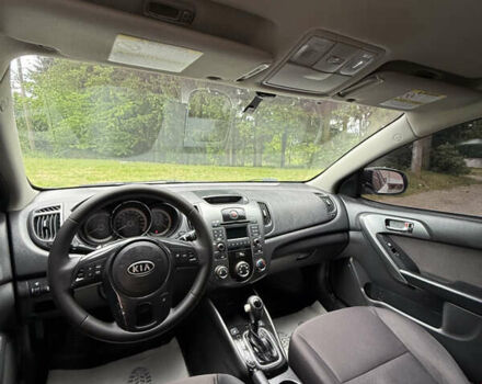 Белый Киа Форте, объемом двигателя 2 л и пробегом 190 тыс. км за 7700 $, фото 24 на Automoto.ua