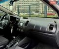 Білий Кіа Форте, об'ємом двигуна 2 л та пробігом 221 тис. км за 8900 $, фото 21 на Automoto.ua