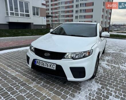 Белый Киа Форте, объемом двигателя 2 л и пробегом 209 тыс. км за 7500 $, фото 1 на Automoto.ua