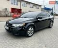 Черный Киа Форте, объемом двигателя 2 л и пробегом 200 тыс. км за 7700 $, фото 1 на Automoto.ua