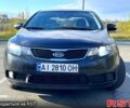 Черный Киа Форте, объемом двигателя 2 л и пробегом 325 тыс. км за 7000 $, фото 1 на Automoto.ua