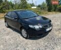 Чорний Кіа Форте, об'ємом двигуна 2 л та пробігом 325 тис. км за 5300 $, фото 1 на Automoto.ua