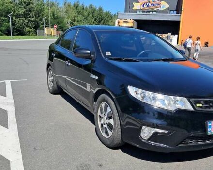 Черный Киа Форте, объемом двигателя 1.6 л и пробегом 171 тыс. км за 7700 $, фото 2 на Automoto.ua