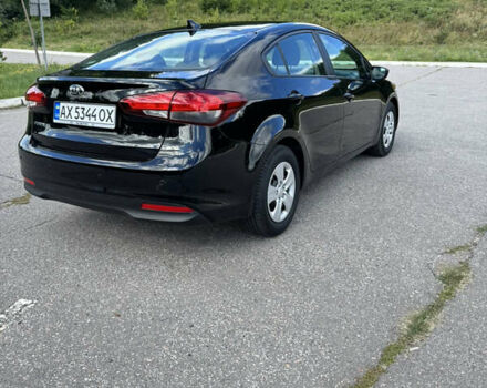Чорний Кіа Форте, об'ємом двигуна 2 л та пробігом 77 тис. км за 10600 $, фото 2 на Automoto.ua