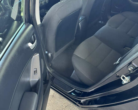 Чорний Кіа Форте, об'ємом двигуна 2 л та пробігом 77 тис. км за 10600 $, фото 13 на Automoto.ua