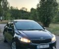 Чорний Кіа Форте, об'ємом двигуна 2 л та пробігом 142 тис. км за 9400 $, фото 1 на Automoto.ua