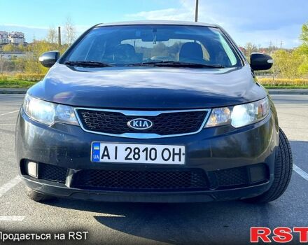 Черный Киа Форте, объемом двигателя 2 л и пробегом 325 тыс. км за 7000 $, фото 1 на Automoto.ua