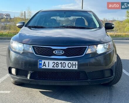 Черный Киа Форте, объемом двигателя 2 л и пробегом 325 тыс. км за 6800 $, фото 1 на Automoto.ua