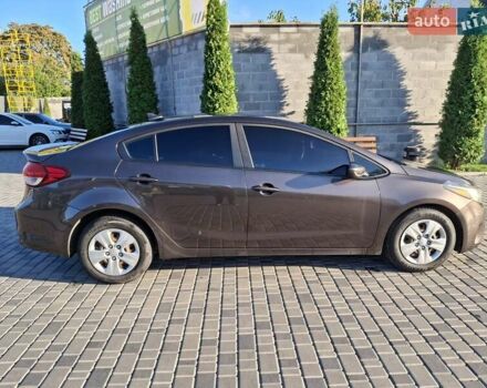 Коричневый Киа Форте, объемом двигателя 2 л и пробегом 242 тыс. км за 10000 $, фото 16 на Automoto.ua