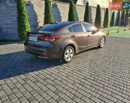 Коричневый Киа Форте, объемом двигателя 2 л и пробегом 242 тыс. км за 10000 $, фото 1 на Automoto.ua