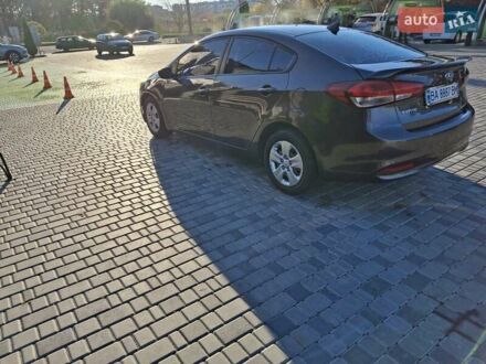 Коричневый Киа Форте, объемом двигателя 2 л и пробегом 242 тыс. км за 10000 $, фото 1 на Automoto.ua