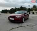 Червоний Кіа Форте, об'ємом двигуна 2 л та пробігом 190 тис. км за 7450 $, фото 1 на Automoto.ua