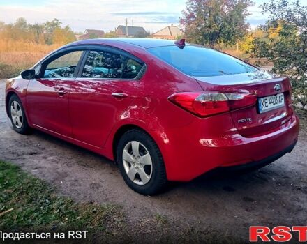 Красный Киа Форте, объемом двигателя 2 л и пробегом 280 тыс. км за 7999 $, фото 5 на Automoto.ua