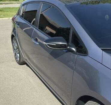 Сірий Кіа Форте, об'ємом двигуна 1.6 л та пробігом 87 тис. км за 14000 $, фото 9 на Automoto.ua