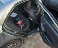 Серый Киа Форте, объемом двигателя 2 л и пробегом 247 тыс. км за 6500 $, фото 2 на Automoto.ua