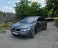 Серый Киа Форте, объемом двигателя 2 л и пробегом 286 тыс. км за 7000 $, фото 1 на Automoto.ua