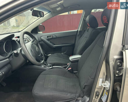 Серый Киа Форте, объемом двигателя 2 л и пробегом 250 тыс. км за 7200 $, фото 22 на Automoto.ua