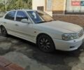 Белый Киа Маджентис, объемом двигателя 2 л и пробегом 275 тыс. км за 2450 $, фото 1 на Automoto.ua
