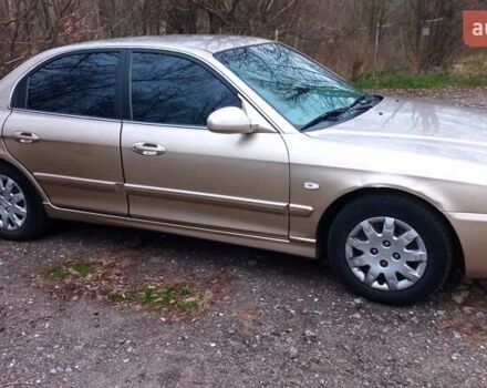 Бежевый Киа Маджентис, объемом двигателя 2 л и пробегом 135 тыс. км за 5500 $, фото 3 на Automoto.ua