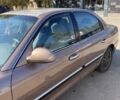 Бежевый Киа Маджентис, объемом двигателя 2 л и пробегом 160 тыс. км за 2400 $, фото 2 на Automoto.ua