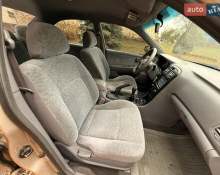 Бежевий Кіа Маджентіс, об'ємом двигуна 2 л та пробігом 165 тис. км за 3900 $, фото 14 на Automoto.ua